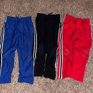 Boys wind pants size 6 Bundle Blue, Black and Red